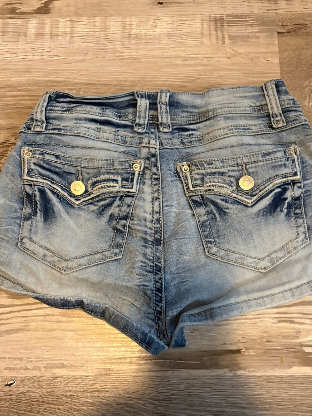 Women’s Light Wash Distressed Denim Shortalls with Button-Accent Back Pockets